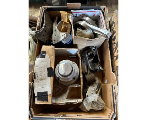 A box of reconditioned JAP racing engine spares. 