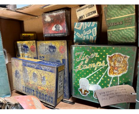 A quantity of new old stock bulbs including a Tiger Lamps tin (with contents), Lucas, Mascott, Endura, Wipac etc. and a Lumax