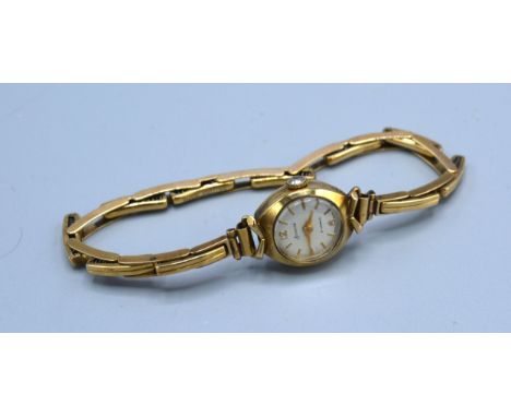 A 9ct Gold Cased Ladies' Wrist Watch by Accurist 12.2 gms all in 