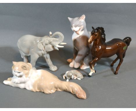 A USSR Porcelain Model Of An Elephant together with a Danish porcelain model of a cat, a Beswick model of a horse, a Lladro p