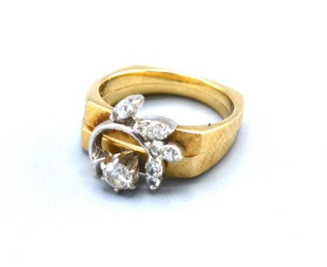 A 14ct Gold Double Diamond Ring to include a solitaire, claw set and another set smaller diamonds interlocking, 6.4 gms, ring