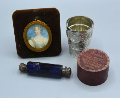 A Blue Glass Double Ended Scent Bottle together with an oval portrait miniature and a stirrup cup 