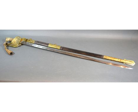 A George VI Naval Officer's Sword with leather and brass scabbard 