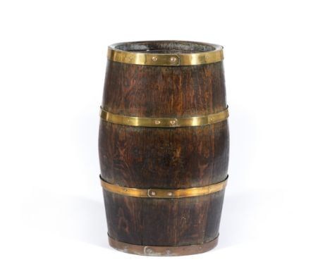 Coopered oak stick stand, with four brass bands, width 38cm, height 62cm.