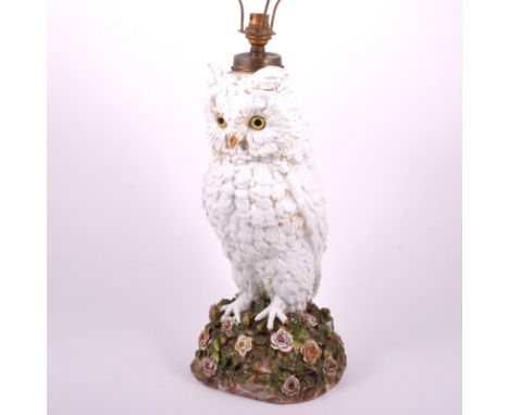 Continental porcelain lamp base, probably French, late 19th  Century, designed as an eared owl, with electric fitment, 67cms.