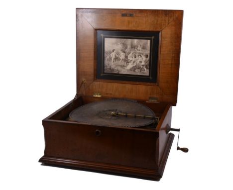 Table-top Symphonium, playing 39cm discs, printed insert to the lid, walnut casing with marquetry decoration to the panelled 