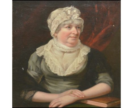 Provincial School,early 19th Century,portrait of a lady, half-length,oil on canvas, 76cm x 64cm.