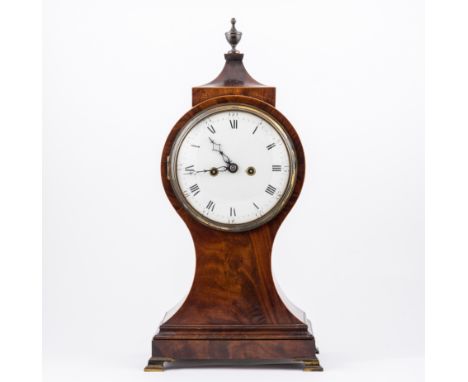 Regency mahogany mantel clock, balloon shape case, with urn finial and pagoda top, ogee brass feet, double fusee movement, st