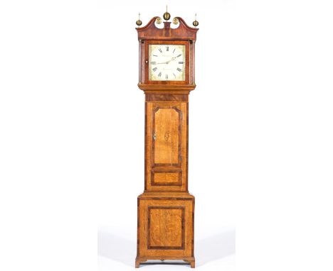 Oak and mahogany loncase clock, the hood with swan-neck pediment, fluted columns, short door with oval shell inlay, bracket f