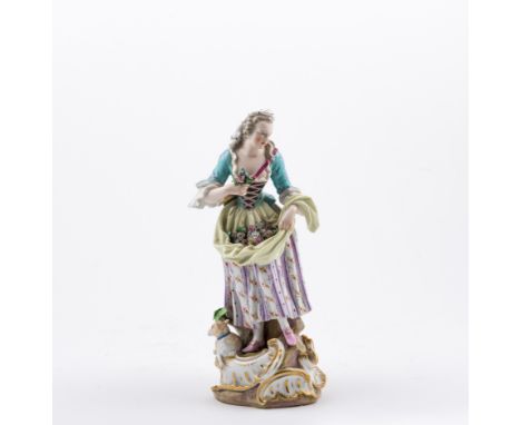 Meissen porcelain figure of a lady shepherdess, 19th Century, with a lamb and an apron filled with flowers, incised 7026, boc