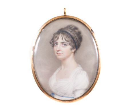 John SmartYoung Lady,bust length, in half profile, portrait miniature,initialled and dated 1804, in an oval rose metal frame,