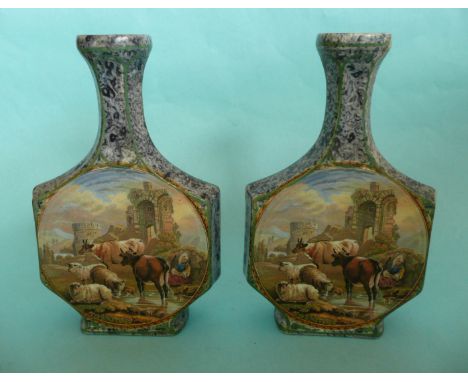 A pair of blue marbled ground flask shaped vases, each restored (2)(Prattware)