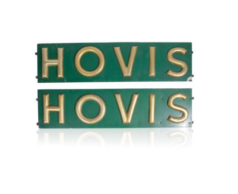 PAIR OF HOVIS ADVERTISING SIGNS each with the famous gilt lettering in relief against a green enamel ground, hanging mounts o