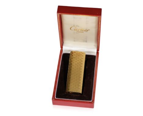 CARTIER: A GOLD PLATED CIGARETTE LIGHTER, textured engine turned case, 20 microns, no. E89285, in fitted presentation case. 