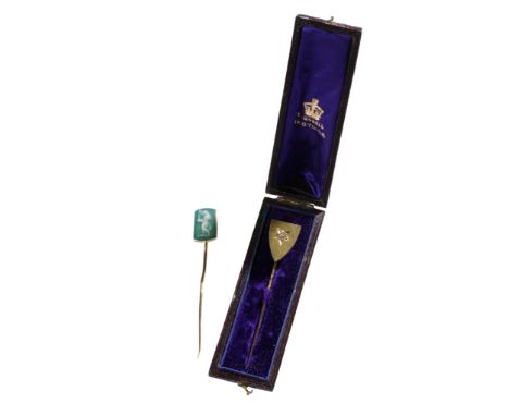 YELLOW METAL STICK PIN SET WITH A SINGLE DIAMOND, in a fitted "E Dobell Hastings" presentation case, one other hardstone came