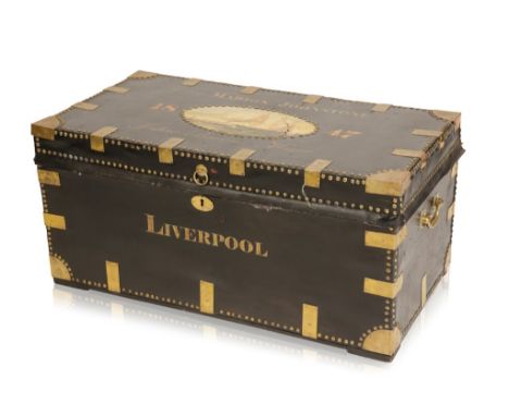 LEATHER COVERED AND BRASS BOUND SHIPPING TRUNK of rectangular form, the rising lid decorated with a painted oval vignette of 