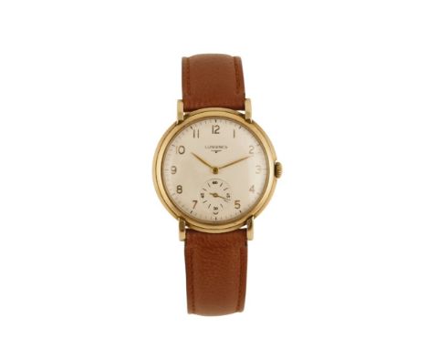 LONGINES GENTLEMAN'S 9CT GOLD WRIST WATCH with manual wind movement, silver dial, gold Arabic numerals, subsidiary dial, gold