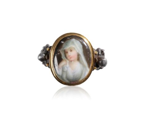 FROMONT MEURICE STYLE, 19TH CENTURY GOLD AND "IRON" PORTRAIT BESPOKE RING, the oval painted porcelain panel of a young lady w