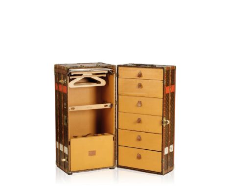 LOUIS VUITTON: A FULL SIZE WARDROBE TRUNK OR MALLE ARMOIRE, c. 1930's, the exterior with the trademark monogram pattern, mono