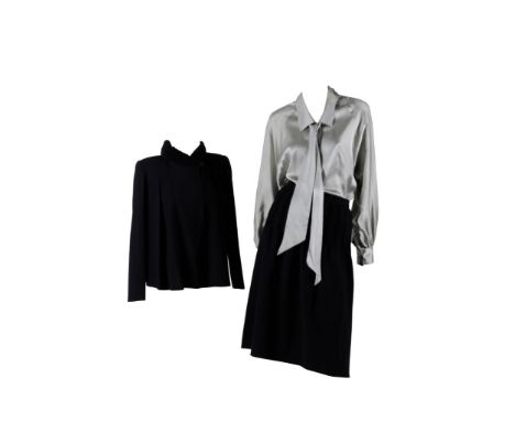 CHLOE: TWO PIECE LADIES SUIT IN BLACK CREPE, the swing style jacket with back pleat and woven looped collar, fastened with si