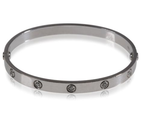 CARTIER 18CT WHITE GOLD LOVE BANGLE, set with ten later addition round-cut diamonds, numbered "HE 5902", together with miniat