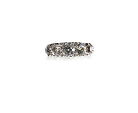 FIVE STONE DIAMOND RING, the centre stone approximately 0.65ct, flanked either side by two graduating diamonds, on an 18ct ye