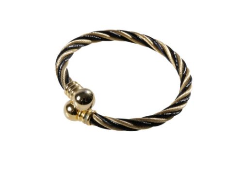TORQUE BANGLE, black and yellow metal expanding cable , with ribbed and ball terminals.