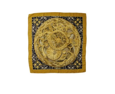 HERMES 'ROUAGES' SILK SCARF, designed by Francois Heron. Released 1966. Predominantly gold with black background. 90 x 90cm w