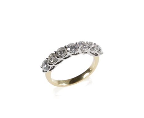 SEVEN STONE DIAMOND RING, each diamond approximately 0.25ct, on an 18k yellow gold shank. Ring size O