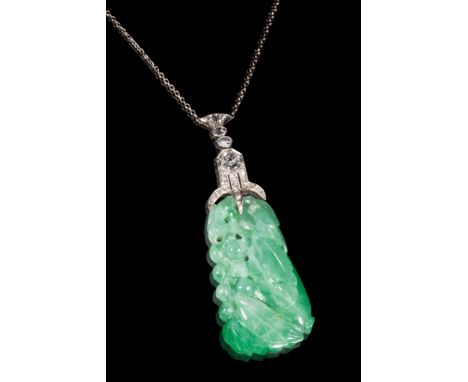 JADE AND DIAMOND pendant NECKLACE, the carved and pierced jade, 4.2cm long, with a diamond set suspension, the largest diamon