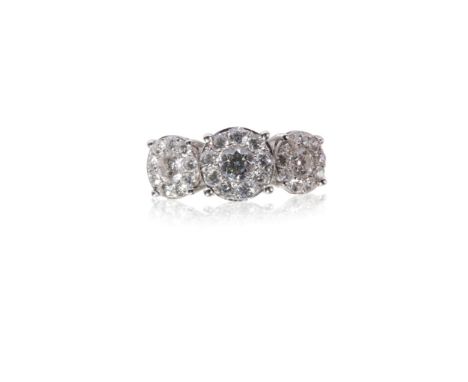 TRIPLE CLUSTER DIAMOND RING, the centre cluster with a brilliant-cut diamond approximately 0.25ct surrounded by a boarder of 