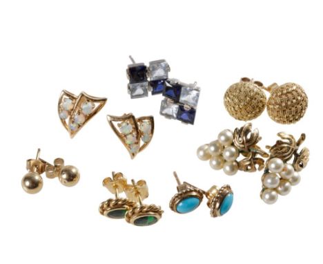 A COLLECTION OF EAR STUDS, to include a pair of opal ear studs set on 14k yellow gold, (7)