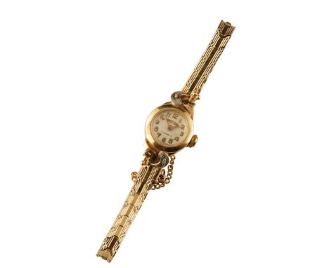 WHITE STAR 18CT GOLD LADY'S BRACELET WATCH with manual wind movement, white dial, gold Arabic numerals and hands, c.1940's, c