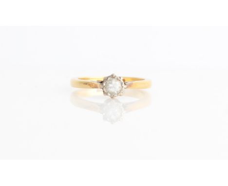 A hallmarked 18ct yellow gold diamond solitaire ring, set with a round brilliant cut diamond measuring approx. 0.25ct, ring s