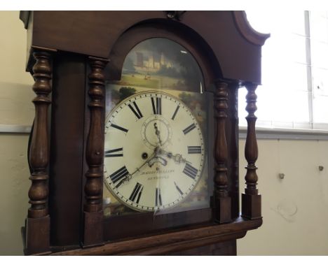 A Morris Williams grandfather clock depicting Raby Castle grounds to face, with claw feet and fleur de lie top.
