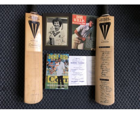 A collection of sporting memorabilia to include signed Bob Willis magazine and photograph, two signed cricket bats, etc.