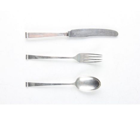 A boxed silver christening set, comprising a fork, knife and spoon, all hallmarked Sheffield 1957, with makers mark CB&amp;S 