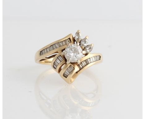 A hallmarked 14ct yellow gold diamond dress ring, set with a central round brilliant cut diamond measuring approx. 0.55ct, in