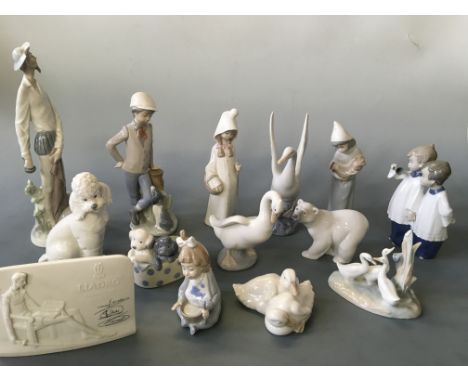 A collection of fourteen items including Lladro and Nao, to include ducks, polar bear, choir boys, girl with chicken, dog, et