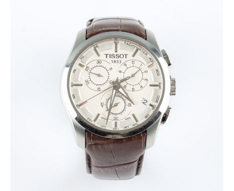 A gents Tissot 1853 tachymeter wrist watch, the white dial having hourly baton markers with three subsidiary dials, on a brow