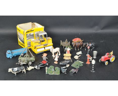 A collection of vintage 20th Century Dinky / Corgie die cast toys. Including tractor, die cast animals, flatbed lorry truck D