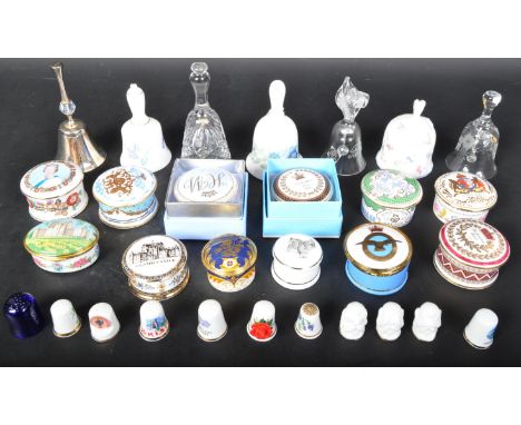 A collection of porcelain and enamel pill boxes to include Buckingham Palace, Royal Mint,&nbsp; Royal Worcester, Royal Collec