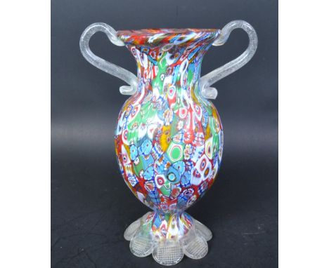 A vintage retro mid 20th century millefiori glass Murano Italian style twin handled vase. The vase having clear twin handles 