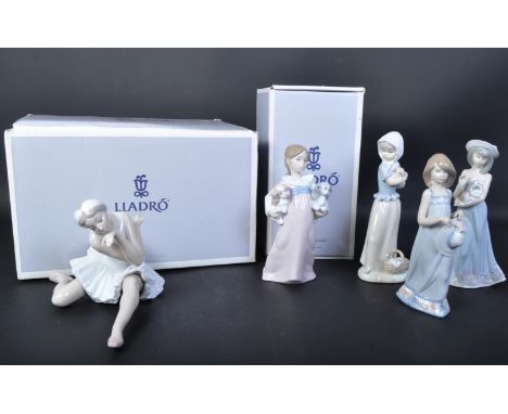 Lladro &amp; Nao - An assortment of vintage 20th century Lladro Spanish porcelain figurines to include 5643 girl holding hat,