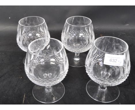 A Regency-style cut-glass ships decanter and four wine glasses