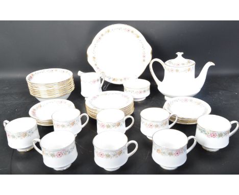 A vintage 20th century Royal Albert Belinda pattern bone china tea service comprising of teapot, teacups, saucers, milk jug, 