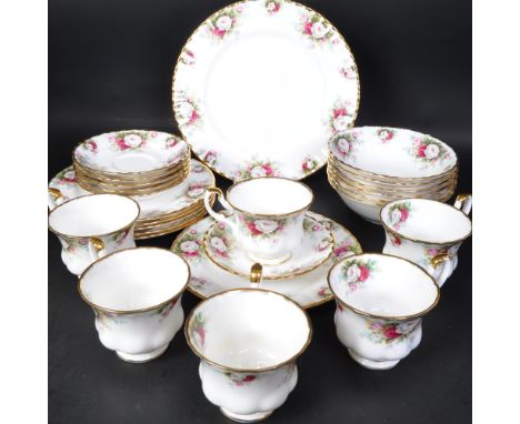 A vintage 20th Century Royal Albert - Celebration pattern tea service. Cups, saucers, serving plates, sugar bowl, milk jug.