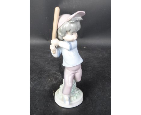 Lladro - Sport Billy series - A vintage 20th century Lladro Spanish porcelain Sport Billy figure to depict boy swinging baseb