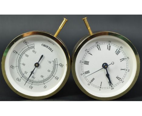 A vintage 20th century German Thermo gauge thermometer in yellow cylindrical case. The lot together with a Thermo clock havin