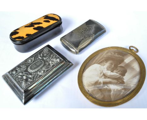 An assortment of three 19th century &amp; later snuff boxes comprising of a George III circa 1830s paper mache with turtle sh